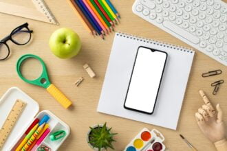 Immerse yourself in the digital learning era with this top-view composition, featuring a keyboard