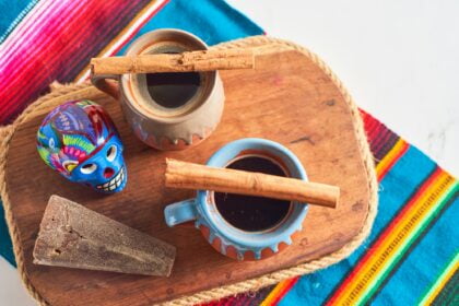 Mexican coffe clay pot with piloncillo and cinnamon, cafe de olla, hot drink from mexico